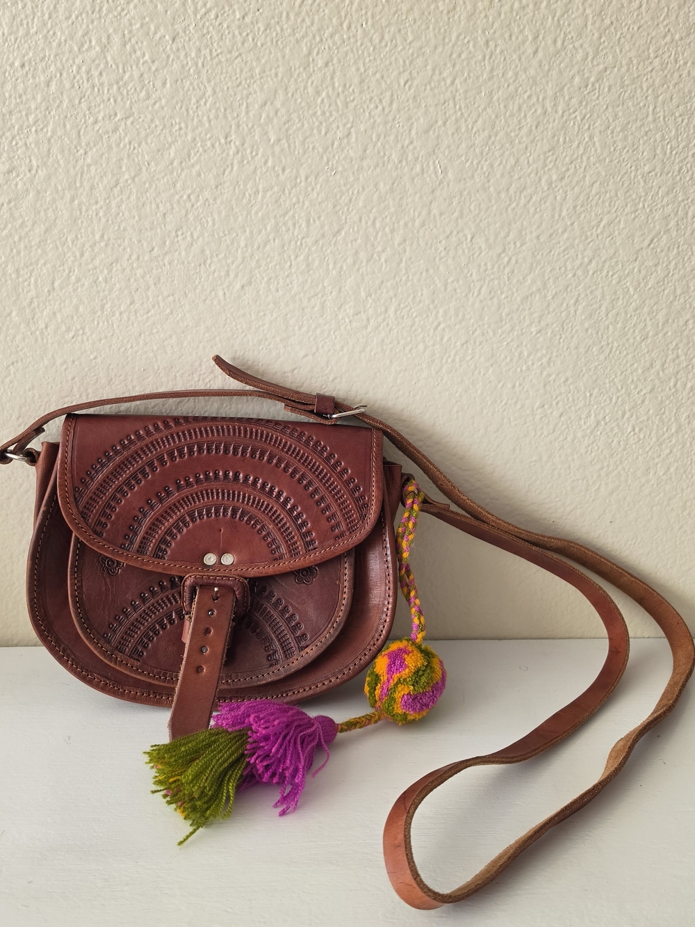 Handcrafted Brown Leather Crossbody Bag with Colorful Tassel